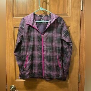 Women’s nylon zip up jacket.